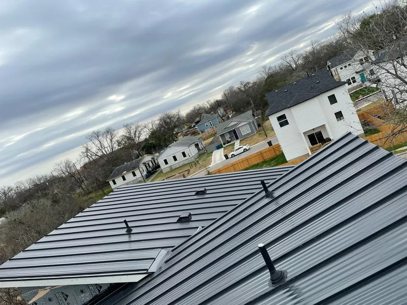 Standing seam metal roof panels with vents for Skylight Repair in Mabank